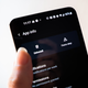 A photo of a finger hovering over the "uninstall" button in the android settings